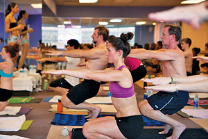 Locals are finding challenge and fulfillment on their mats. Photo by Huguette Roe